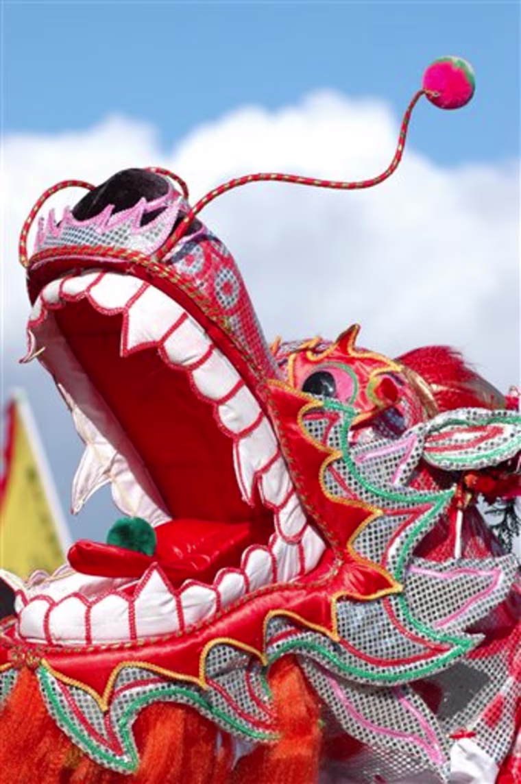 This photo released by Tourism British Columbia shows a colourful dragon's mouth costume in the Chinese New Year Parade in Vancouver's Chinatown.(AP Photo/Tourism British Columbia,Tom Ryan)**NO SALES**